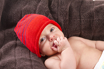 Image showing baby boy over brown blanket