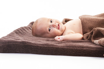 Image showing baby boy over brown blanket