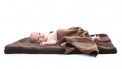 Image showing baby boy over brown blanket