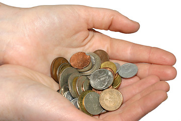 Image showing Two hands holding coins