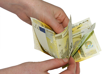 Image showing Hand holding euro bills