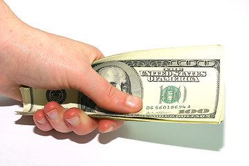 Image showing Hand holding 100 dollars bills