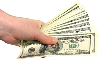 Image showing Hand holding 100 dollars bills