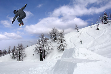 Image showing Snowboarder Extreme jumping