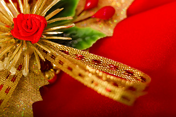 Image showing Christmas card. Red cloth with decorations