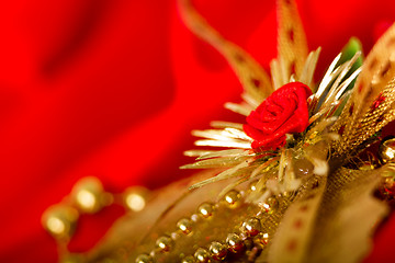 Image showing Christmas card. Red cloth with decorations