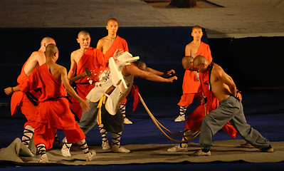 Image showing Shaoling monks showing off their marshal arts skills