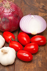 Image showing onion garlic and tomatoes