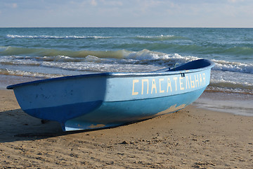 Image showing The blue lifeboat on the bank of the Black Sea.