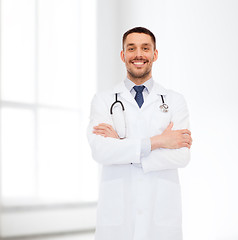 Image showing smiling male doctor with stethoscope