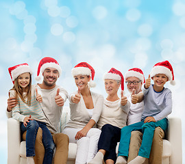 Image showing happy family sitting on couch