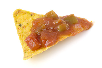 Image showing Nacho chip dripped with salsa sauce

