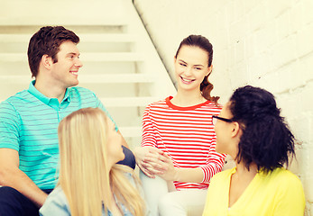 Image showing smiling teenagers hanging out