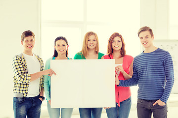 Image showing students at school holding white blank board