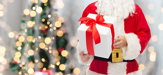 Image showing man in costume of santa claus with gift box