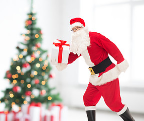 Image showing man in costume of santa claus with gift box