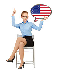 Image showing smiling woman with text bubble of american flag