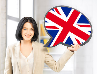 Image showing smiling woman with text bubble of british flag