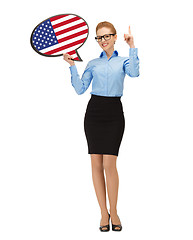 Image showing smiling woman with text bubble of american flag