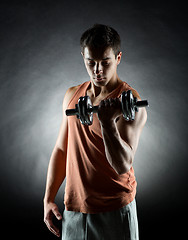 Image showing young man with dumbbell