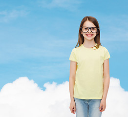 Image showing smiling cute little girl in black eyeglasses