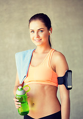 Image showing woman with bottle of water in gym