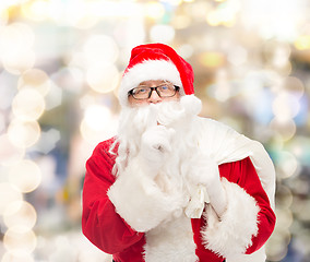 Image showing man in costume of santa claus with bag