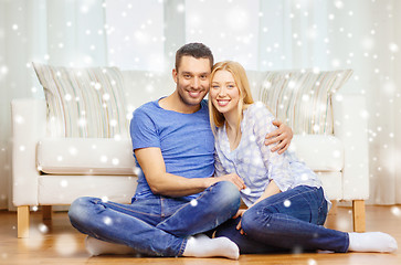 Image showing happy couple hugging at home