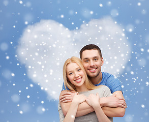 Image showing happy couple hugging outdoors