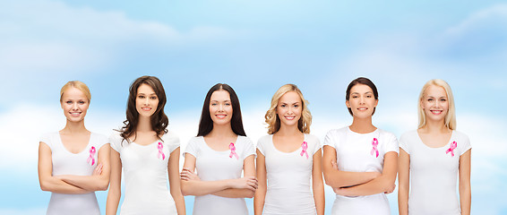 Image showing smiling women with pink cancer awareness ribbons