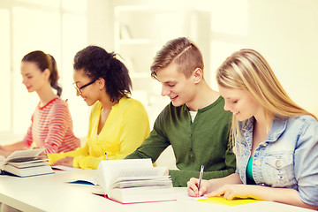 Image showing students with textbooks and books at school