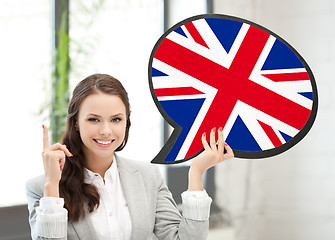 Image showing smiling woman with text bubble of british flag