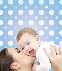 Image showing laughing baby playing with mother