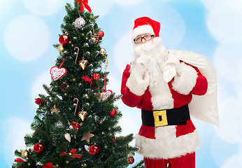 Image showing santa claus with bag and christmas tree