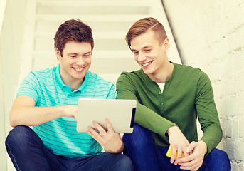 Image showing smiling male students with tablet pc computer