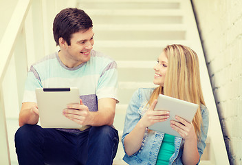 Image showing smiling students with tablet pc computer