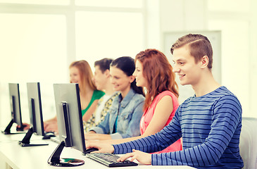 Image showing male student with classmates in computer class