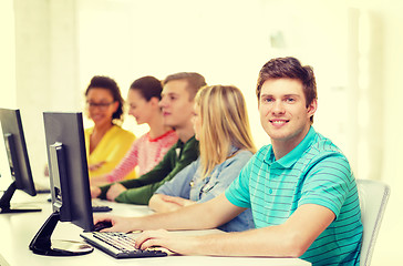 Image showing male student with classmates in computer class