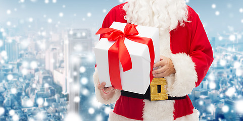 Image showing man in costume of santa claus with gift box