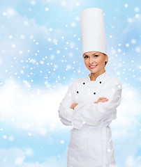 Image showing smiling female chef dreaming