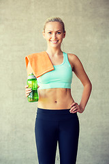 Image showing woman with bottle of water in gym