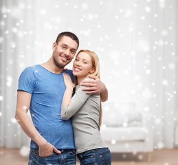 Image showing happy couple hugging at home