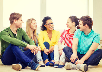 Image showing five smiling teenagers having fun at home