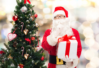 Image showing man in costume of santa claus with gift box