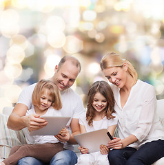 Image showing happy family with tablet pc computers