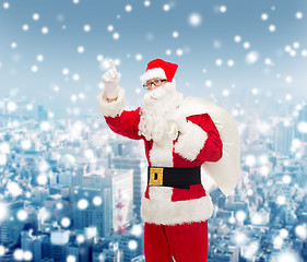 Image showing man in costume of santa claus with bag