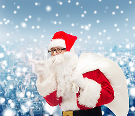 Image showing man in costume of santa claus with bag