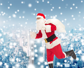 Image showing man in costume of santa claus with bag