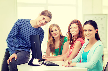 Image showing group of smiling students having discussion