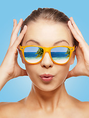 Image showing amazed teenage girl in sunglasses